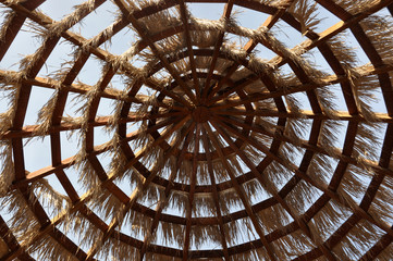 Straw umbrella view from inside