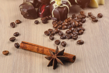 cinnamon with homemade sweets on a wooden background