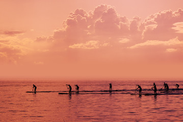 Stand up paddle boarding competition on open sea