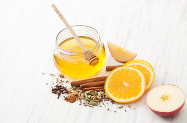 Ingredients for mulled wine on white kitchen table