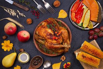Chicken or turkey,  autumn food eating. Thanksgiving Day and Harvest food  background. Top view