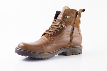 Male brown leather shoe on white background, isolated product, comfortable footwear.