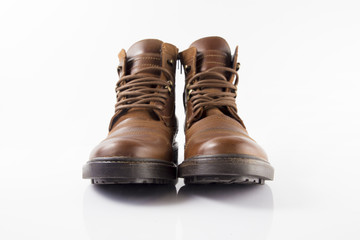 Male brown leather shoe on white background, isolated product, comfortable footwear.