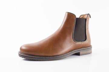 Male brown leather boot on white background, isolated product.
