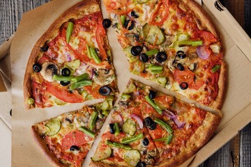 Delicious vegetarian pizza on a rye dough with vegetables