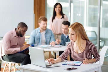 Group of workers discussing new project