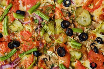 Delicious vegetarian pizza on a rye dough with vegetables 