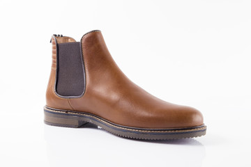 Male brown leather boot on white background, isolated product.