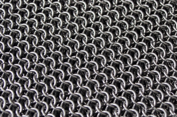 Metal chainmail ring pattern background