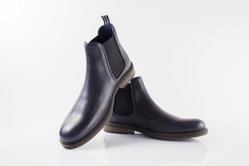 Male blue leather shoe on white background, isolated product, comfortable footwear.