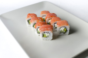 Sushi Philadelphia on a creamy plate