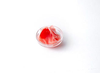 Marinated ginger in a transparent sauce vessel
