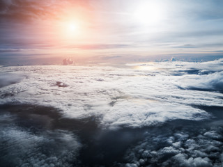 The sky bakground in Morning time,reflection of sunlight is shining to smoky waving cloud,beautiful top view,beauty by nature.