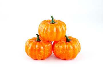Plastic toy pumpkin for halloween decoration isolated on white background