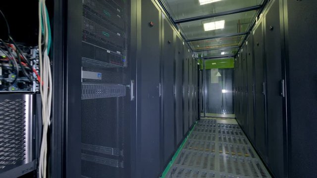 Working computers for bitcoin mining at a modern server room. 4K.