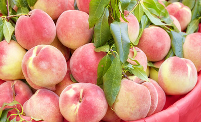 Fresh peaches an a local market, selective focus.