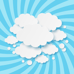 Paper clouds on blue background