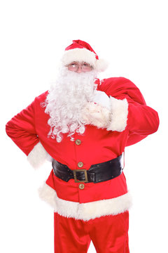 Kind Santa Claus carrying big bag, isolated on white background