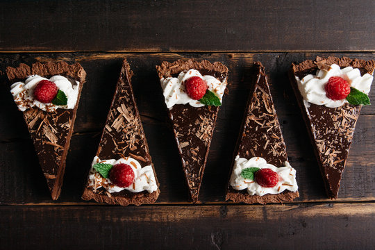 Slices of chocolate tart arranged in a pattern