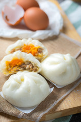 chinese steamed buns on wood container , selective focus