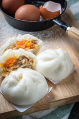 chinese steamed buns on wood container , selective focus