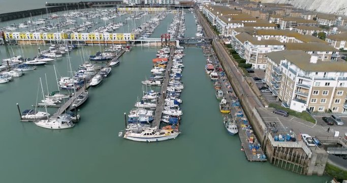 Aerial ascending view of sailing boats in a marina in Brighton, Southern England