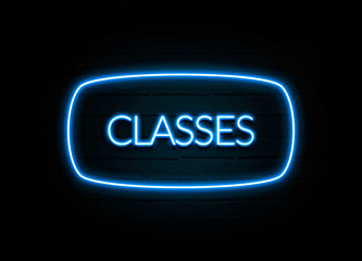 Classes  - colorful Neon Sign on brickwall