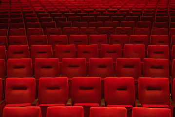 Red theatre seats in rows