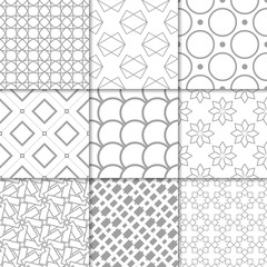 Fototapeta premium Light gray geometric ornaments. Collection of seamless patterns