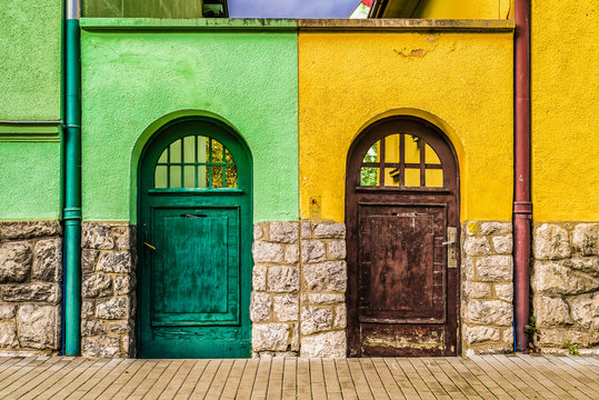 Colorful green and brown doors symbolizing choice and opportunity