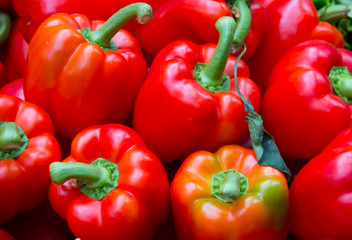 Pile of sweet bell red pepper as a background