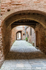 Naklejka premium Alleyway in an old Italian village