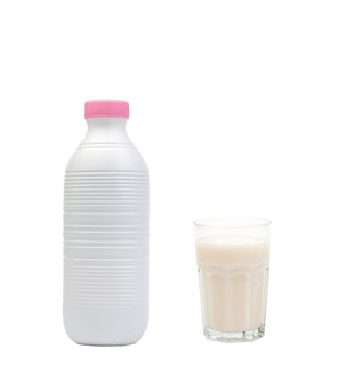 Bottle of milk with a full glass