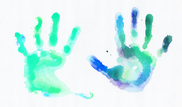 Watercolor handprints over white background