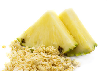 Freeze dried and fresh pineapple ananas on a white background.