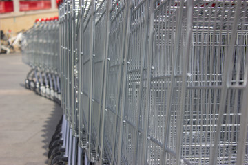 a supermarket trolley in silver color