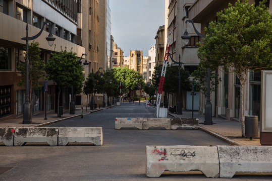 Roadblocks in Rue du Parlement that limit access to central Jenmeh Square, in Beirut, Lebanon