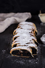 strudel on black background