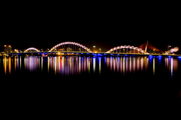 Luminous dragon bridge in the city of Danang. Vietnam.
