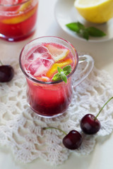 Homemade icy cherry lemonade in glasses