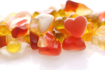 gummy candy with cola heart egg ring bear isolated in white background