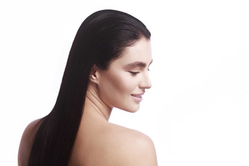 Fototapeta premium portrait of a girl in profile on a white background