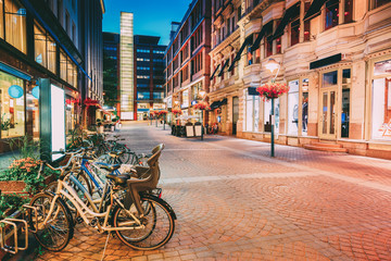 Helsinki, Finland. Bicycles Parked Near Storefronts In Kluuvikatu Street