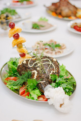 Christmas leg ham on a restaurant table.