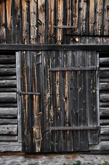 Wooden barns. Traditional agricultural buildings in the alpine region.