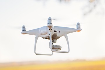White drone quadcopter with camera i