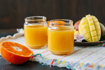 Mango and orange detox juice made from fresh fruits.