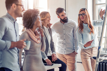 Young creative business people at office