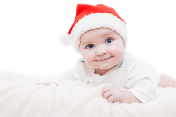Happy baby in Santa hat
