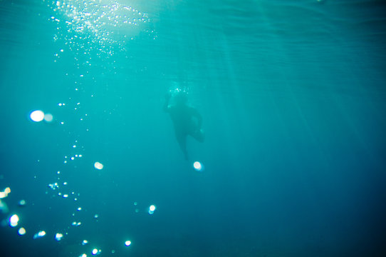 Man diving underwater